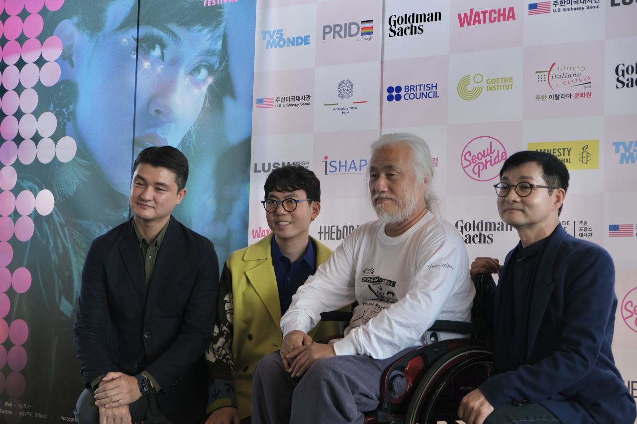 From left: Seoul Pride 2022 International Film Festival organizers Lee Dong-yoon, Kim Seung-hwan, Solidarity Against Disability Discrimination Park head Kyung-seok and SIPFF executive committee head Kim Jho Gwang-soo pose for photos following a press conference held at the Artnine Theater in Sadang-dong on Thursday.  (SIPFF)