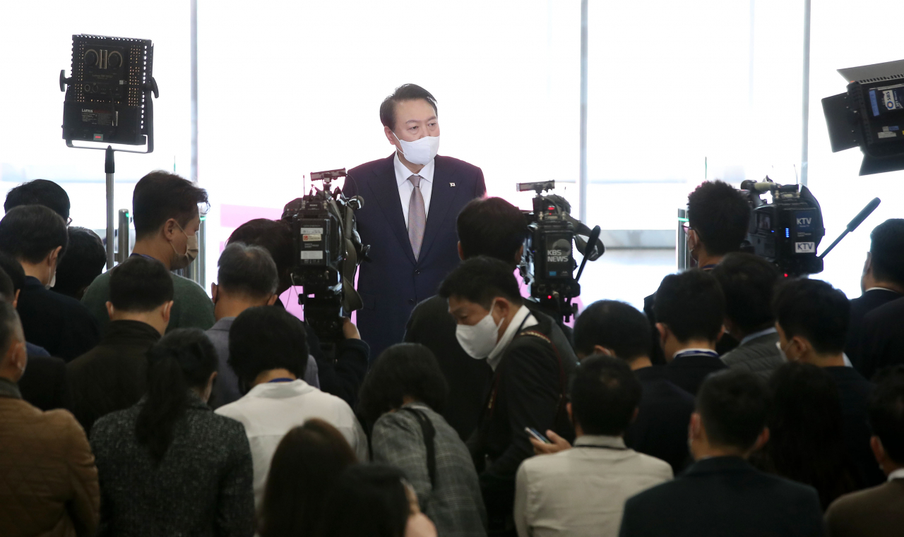 President Yoon Suk-yeol speaks to reporters as he arrives at the presidential office in Seoul on Thursday (Yonhap)