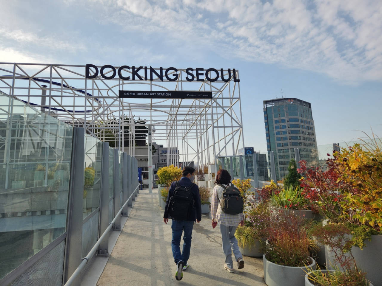 People walk toward an entrance of Docking Seoul. (Choi Jae-hee / The Korea Herald)