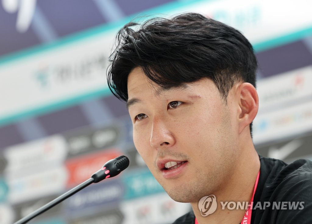 South Korean captain Son Heung-min speaks at a press conference after a training session for the FIFA World Cup at Al Egla Training Facility in Doha on Nov. 16, 2022. (Yonhap)