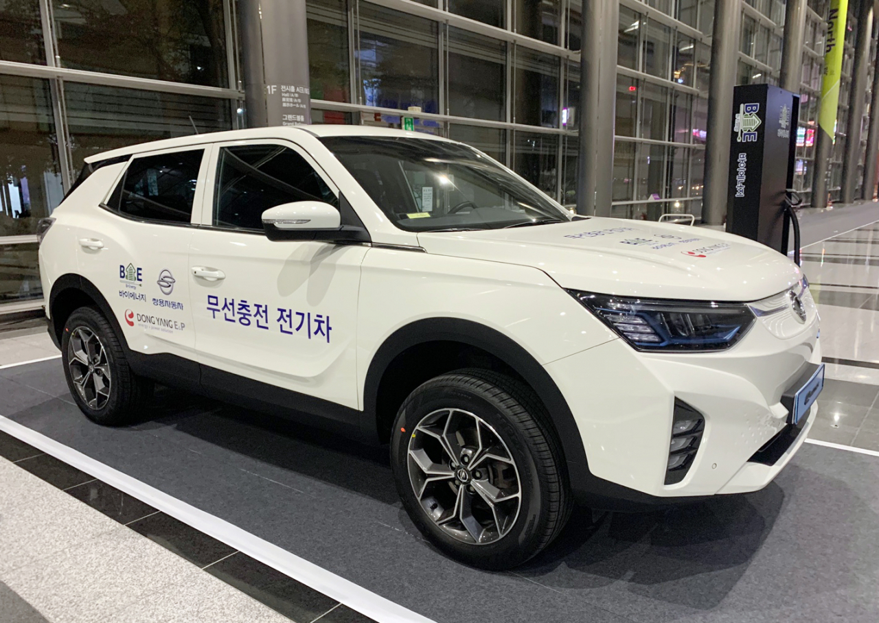 A wireless charging platform for EVs currently under development by SsangYong Motor is displayed at the 2022 Radio Wave Broadcast Week event in Coex, Seoul, Monday. (SsangYong Motor)
