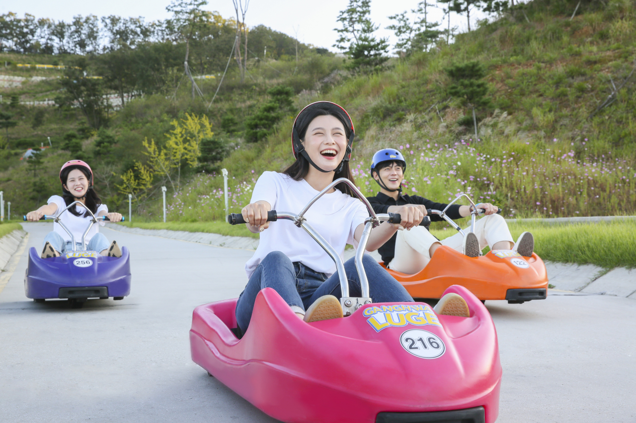 Visitors pose for photos at Ganghwa Luge. (Ganghwa Luge)