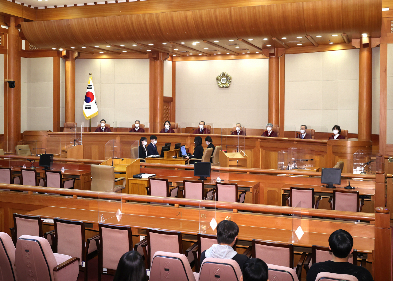 Constitutional Court judges ruled that it is unconstitutional to force soldiers to participate in religious events at the Army Training Center, Thursday. (Yonhap)