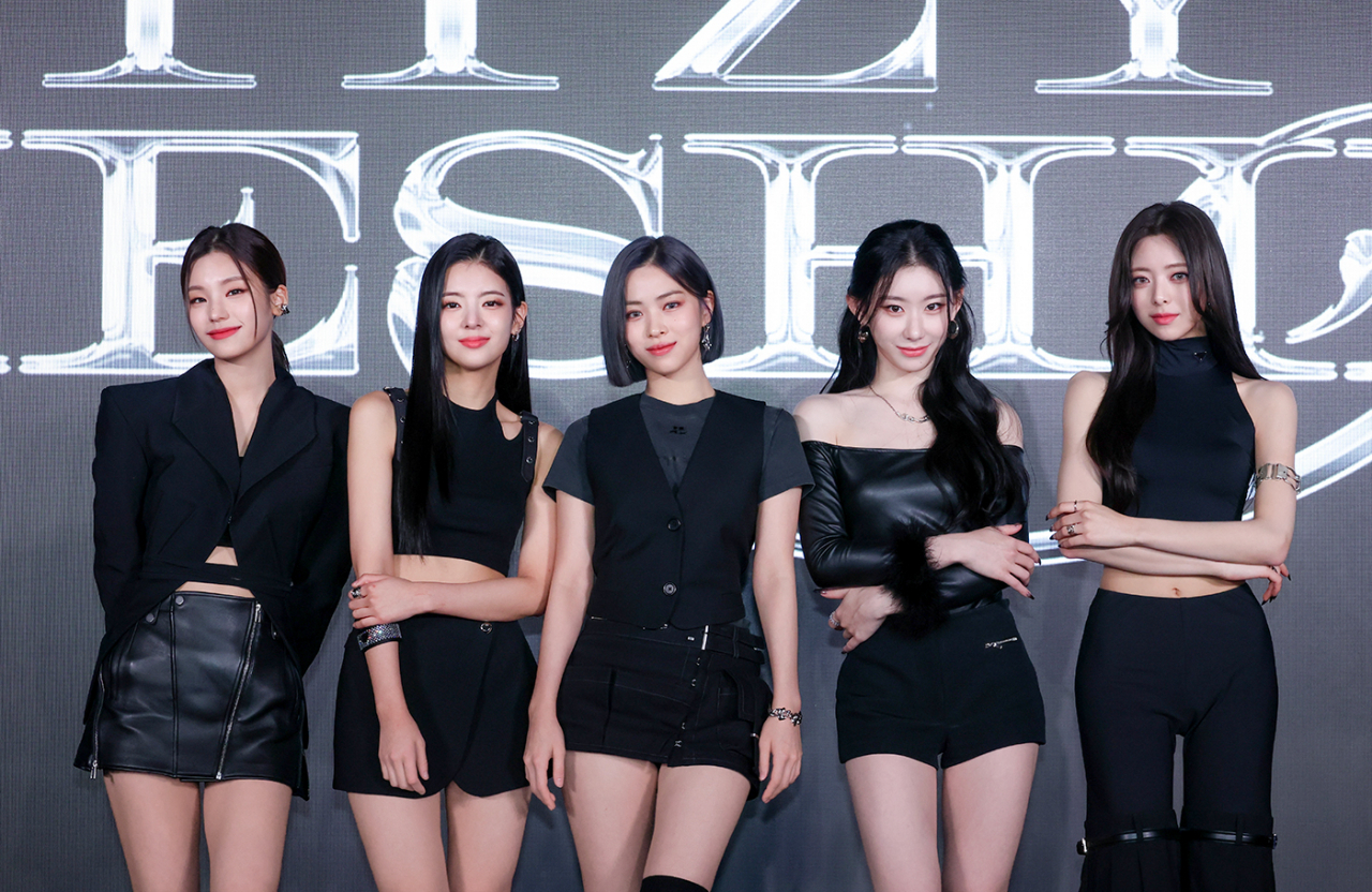 Girl group Itzy poses during a press conference in Seoul for its new album, “Cheshire,” on Friday. (JYP Entertainment)