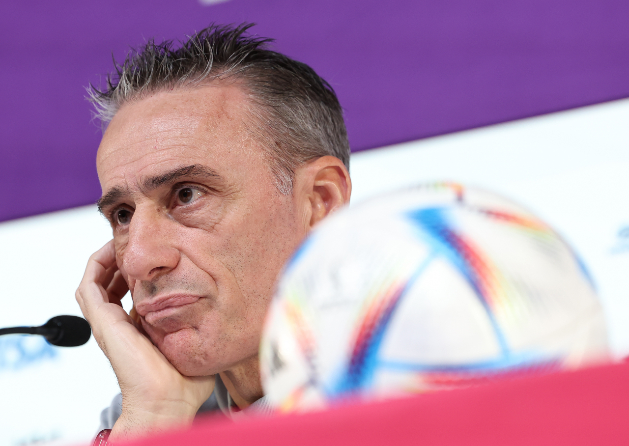 South Korea head coach Paulo Bento listens to a question at a press conference ahead of his team's Group H match against Ghana at the FIFA World Cup at the Main Media Centre in Al Rayyan, west of Doha, last Sunday. (Yonhap)