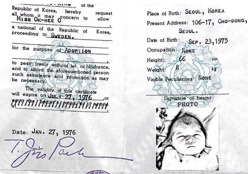 A photograph shows Karin Jensen's original Korean passport issued when she was adopted by a Swedish couple. (Courtesy of Jensen)