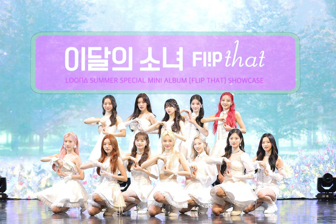 K-pop act Loona poses at a press conference for its special album. (BlockBerry Creative)