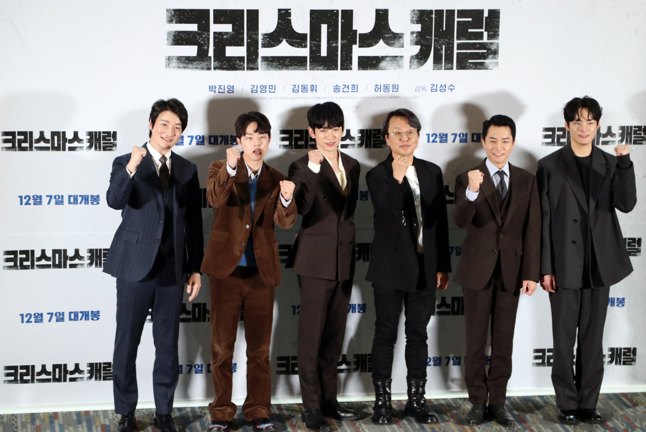 (From left) Actors Heo Dong-won, Kim Dong-hwi, Park Jin-young, director Kim Sung-soo, actors Kim Young-min and Song Geon-hee pose for photos at a press conference for the upcoming thriller film 