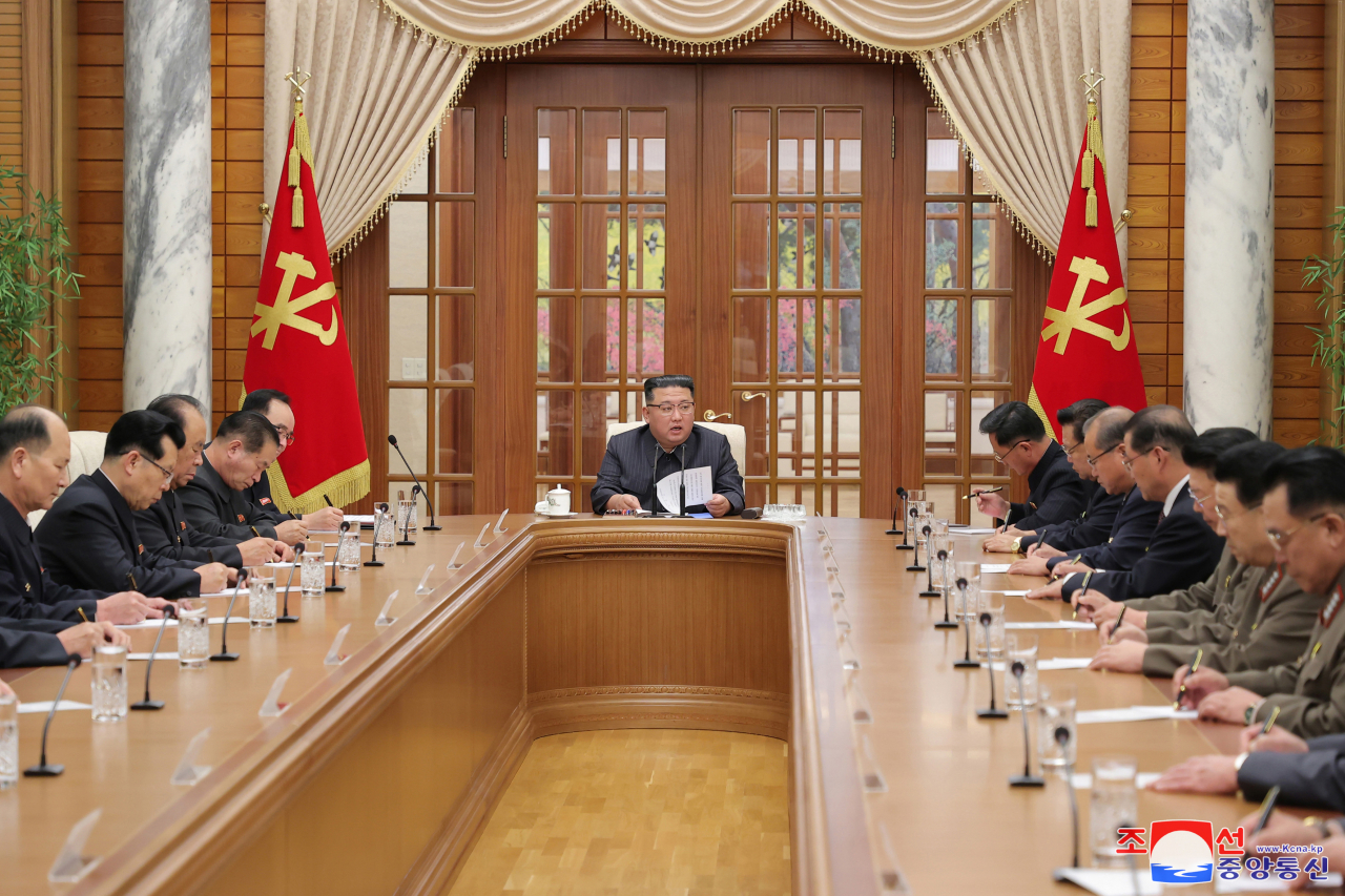 North Korean leader Kim Jong-un (center) presides over a meeting of the committee's political bureau at the headquarters of the Central Committee in Pyongyang on Wednesday. (KCNA)