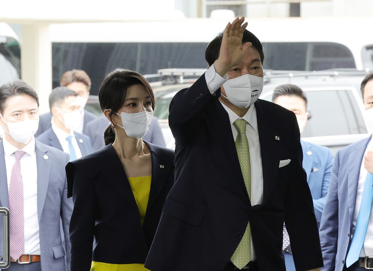 First lady Kim Keon-hee (left) and President Yoon Suk-yeol.