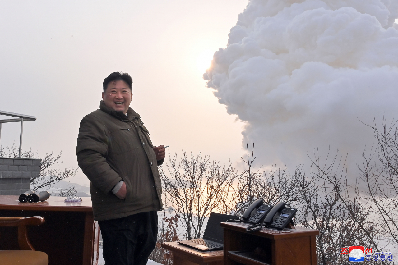 North Korean leader Kim Jong-un inspects a ground test of a 