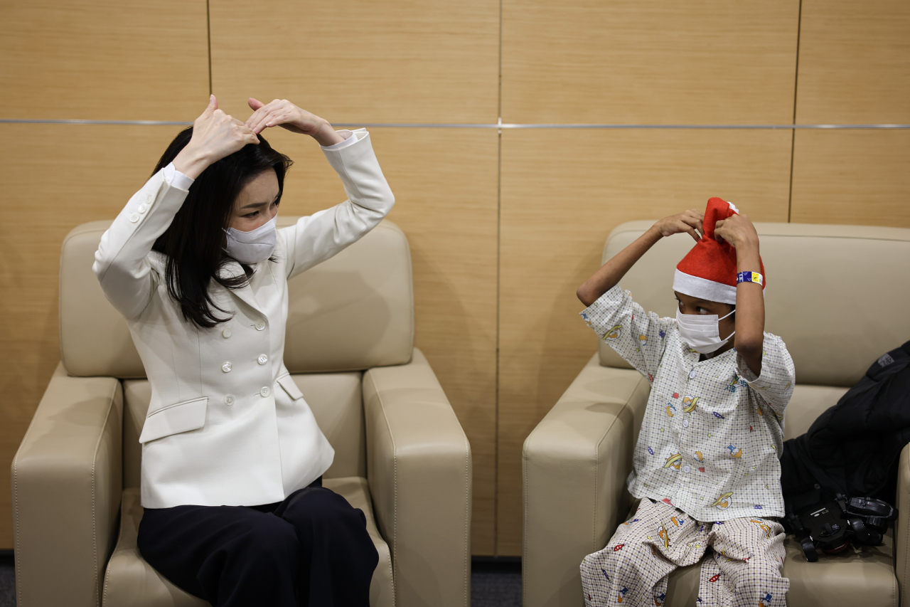 First lady Kim Keon-hee on Wednesday reunited with the 14-year-old boy with heart disease she met in Cambodia. (Yonhap)