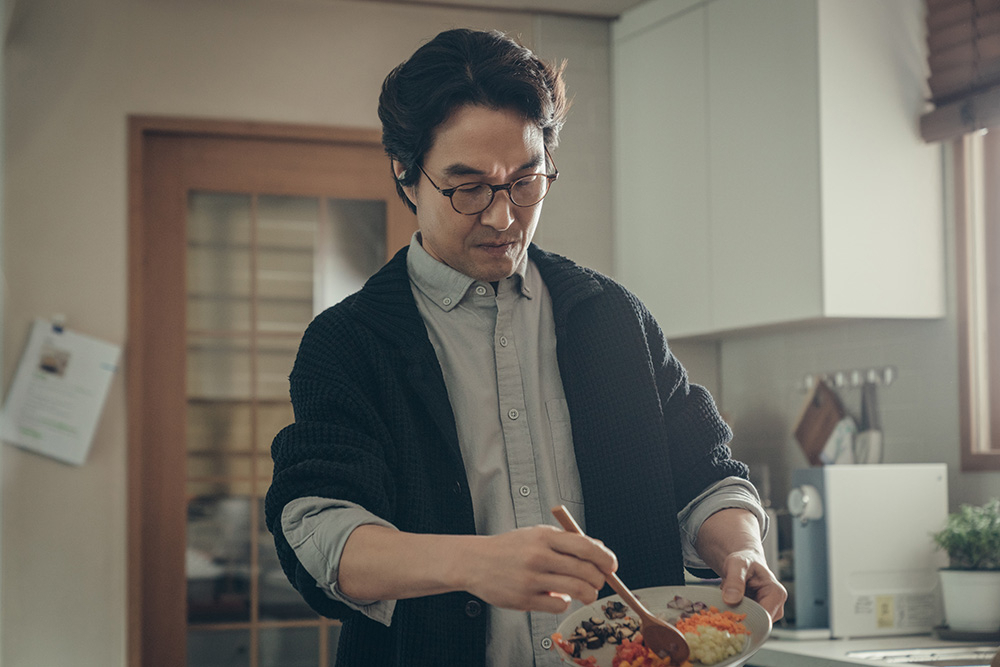 Han Seok-kyu plays Chang-wook, a middle-aged man who learns to cook for his terminally ill wife in 