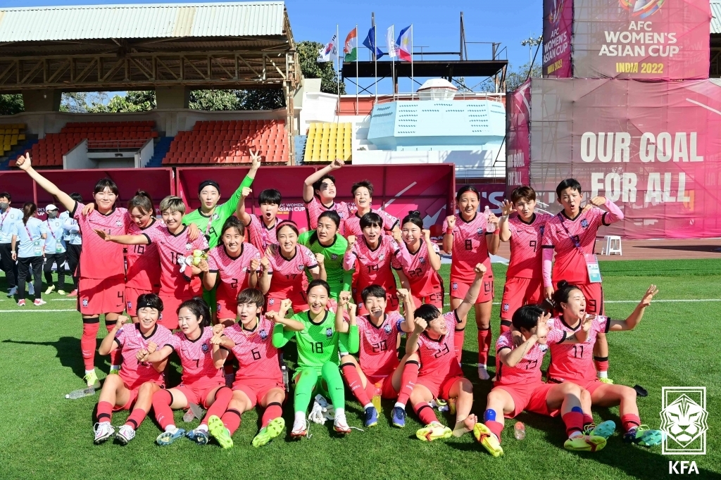 South Korean players celebrate their 2-0 victory over the Philippines in the semifinals of the Asian Football Confederation Women's Asian Cup at Shree Shiv Chhatrapati Sports Complex in Pune, India, on Thursday, in this photo provided by the Korea Football Association. (KFA)