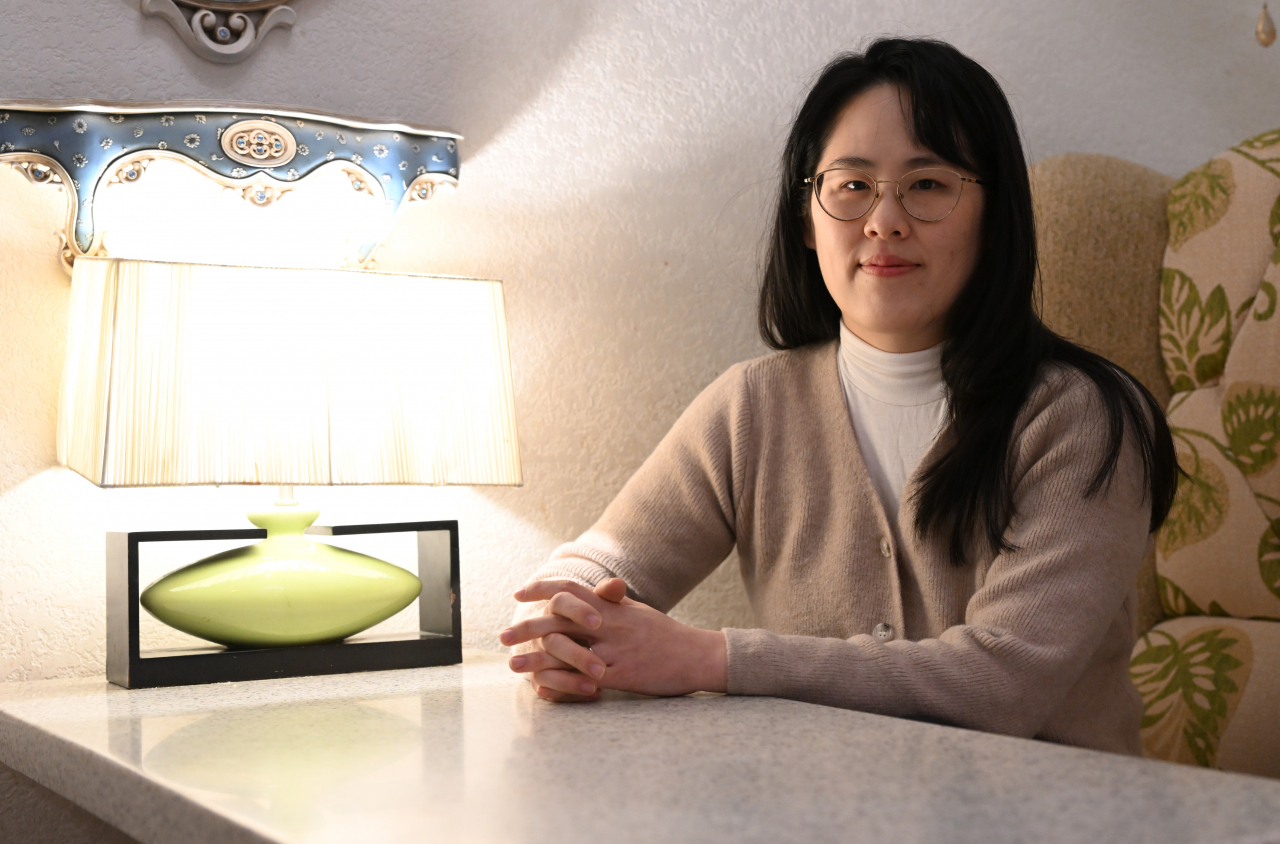 Author June Hur speaks in an interview with The Korea Herald in Bucheon, Gyeonggi Province, on Dec. 28. (Im Se-jun/The Korea Herald)