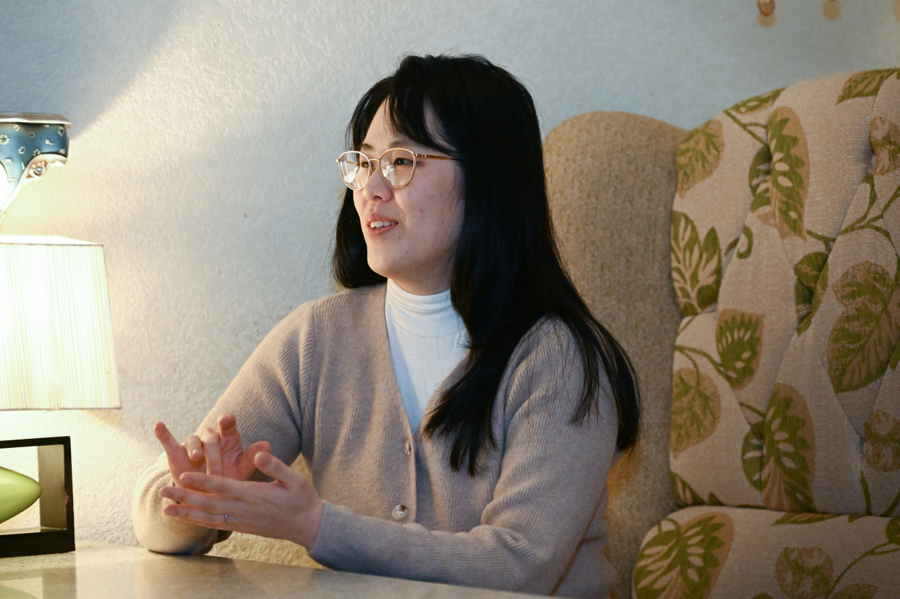 Author June Hur speaks in an interview with The Korea Herald in Bucheon, Gyeonggi Province, on Dec. 28. (Im Se-jun/The Korea Herald)