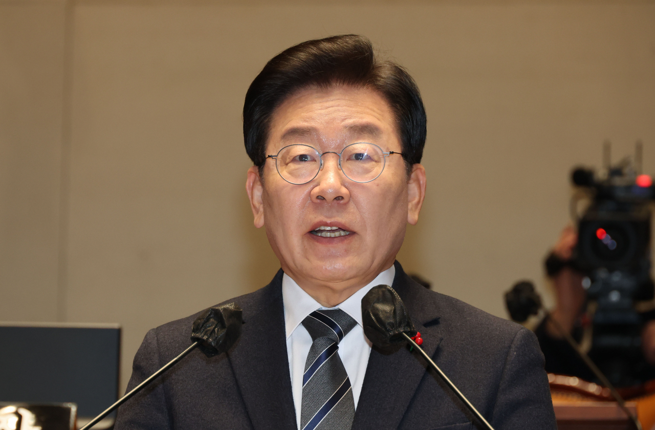 Lee Jae-myung, leader of the Democratic Party of Korea, speaks at the National Assembly on Friday. (Yonhap)