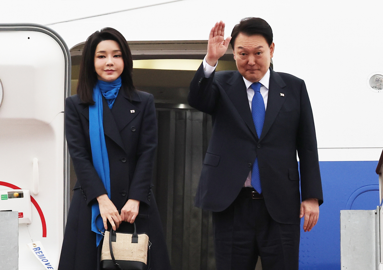President Yoon Suk Yeol and first lady Kim Keon Hee departs for the United Arab Emirates, on Saturday. (Yonhap)