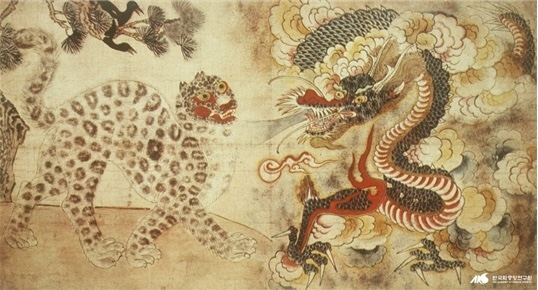 A Joseon-era picture of a tiger and dragon being attached to a gate. (The Academy of Korean Studies)