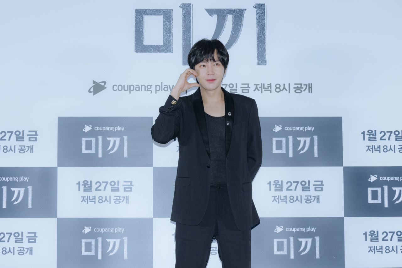 Jang Keun-suk poses for photos after a press conference at Megabox Coex in Seoul, Wednesday. (Coupang Play)