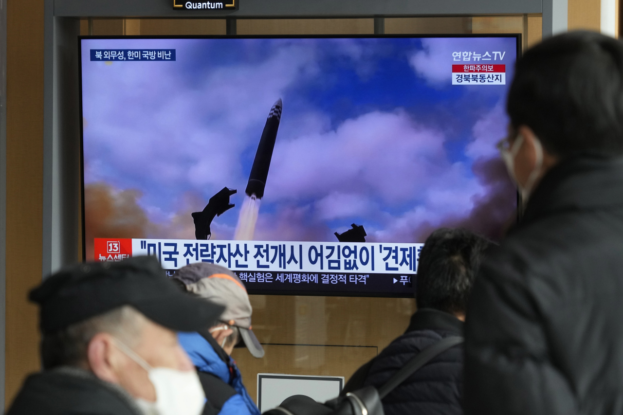 A TV screen shows a file image of North Korea`s missile launch during a news program at the Seoul Railway Station in Seoul, South Korea, Thursday, Feb. 2. 2023. North Korea said Thursday it`s prepared to counter U.S. military moves with the 