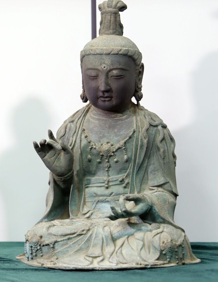 Gilt-bronze seated Bodhisattva statue, currently held at the National Institute of Cultural Heritage (Yonhap)