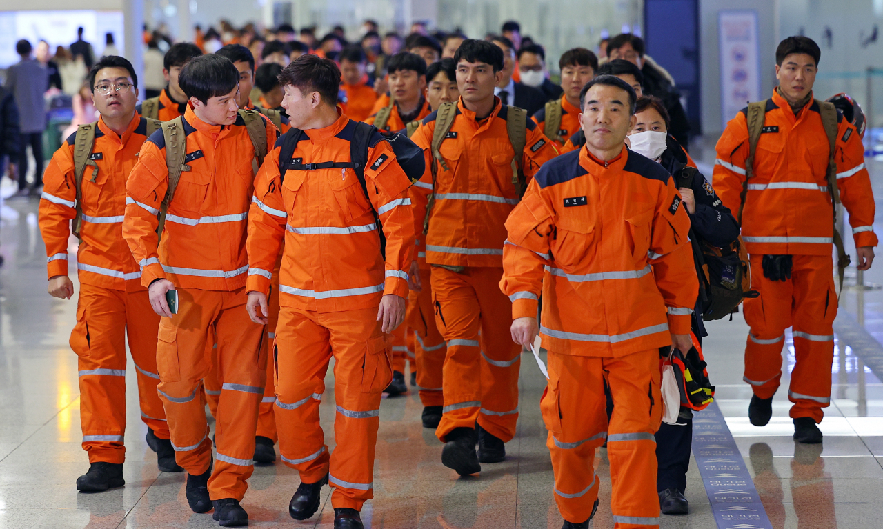 A team of South Korean rescuers leaving for Turkey after a powerful earthquake left at least 5,000 people dead in southern Turkey and northern Syria, on Tuesday at Incheon International Airport. (Yonhap)