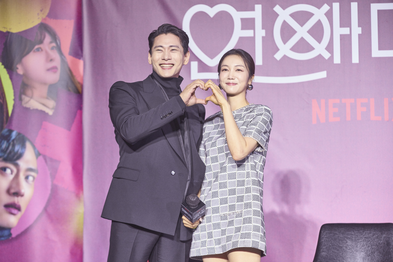 Actors Yoo Teo (left) and Kim Ok-vin pose for photos before a press conference at CGV Yongsan in Yongsan, central Seoul, Wednesday. (Netflix)