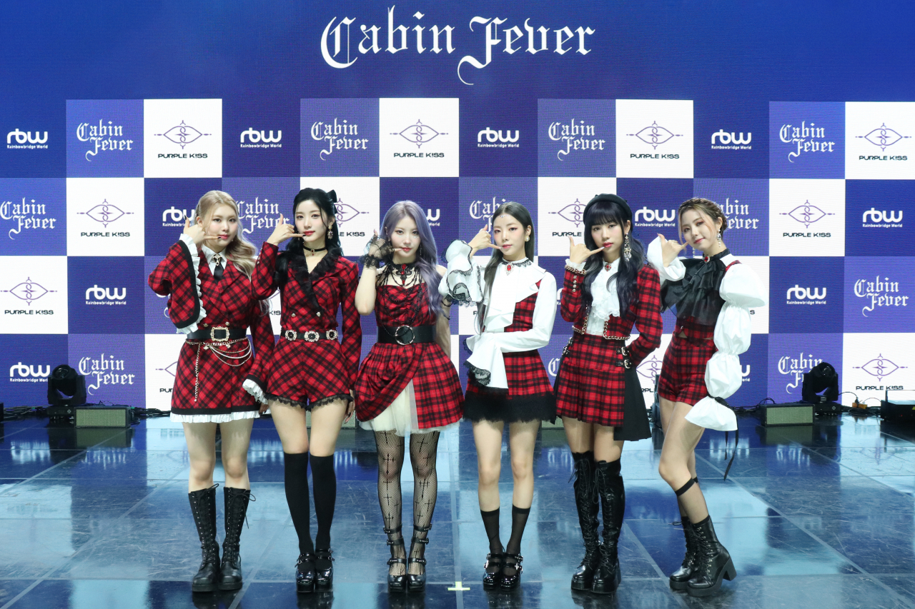 K-pop band Purple Kiss pose for picture during the press conference for its 5th EP 