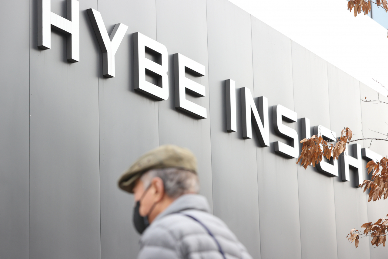A pedestrian passes the main building of Hybe, the K-pop giant behind global K-pop act BTS, in Seoul, Feb. 10. (Yonhap)