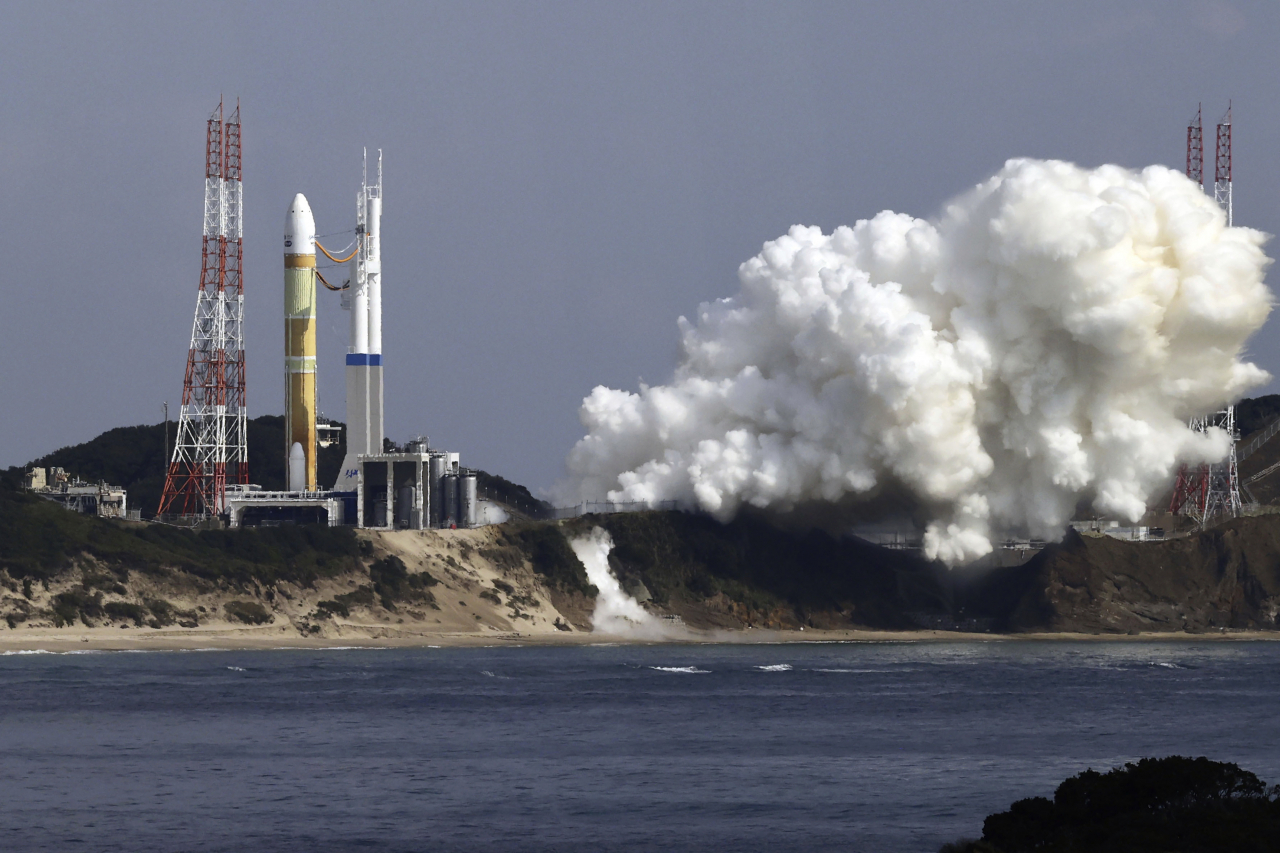 An H3 rocket sits on the launch pad at Tanegashima Space Center in Kagoshima, southern Japan Friday, Feb. 17, 2023. Japan’s space agency aborted a planned launch Friday of the first of its new flagship series H3 rocket. (Kyodo News via AP)