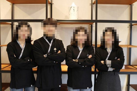 Employees are pictured wearing their official uniforms at the Korea Traditional Culture Center in Jeonju, North Jeolla Province. (KTCC)