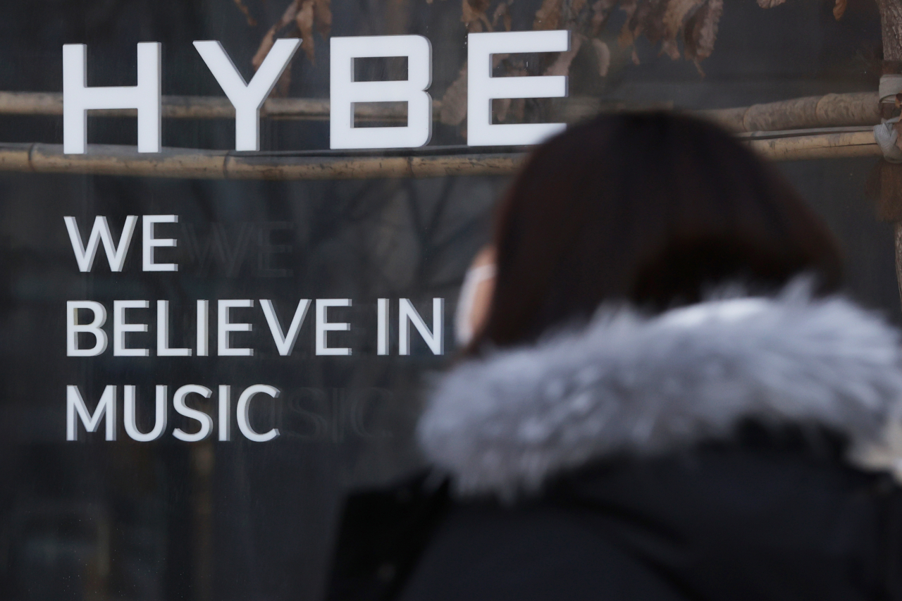 A pedestrian passes the main building of Hybe, the K-pop giant behind global K-pop act BTS, in Seoul, Feb. 21. (Yonhap)