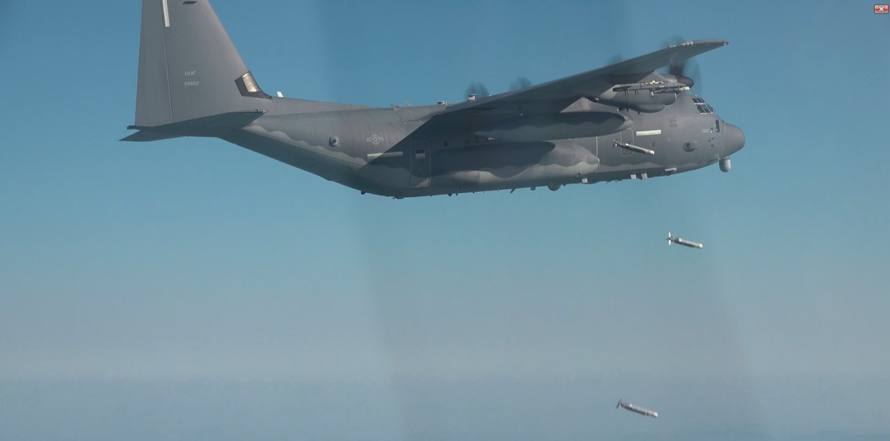 The US Air Force Special Operations Command’s AC-130J Ghostrider gunship fires GBU-39 precision-guided glide bombs at a target in waters off the western coast of the Korean Peninsula during monthlong Teak Knife combined military exercises of South Korean and US special operations forces that began in early February. (Joint Chiefs of Staff)