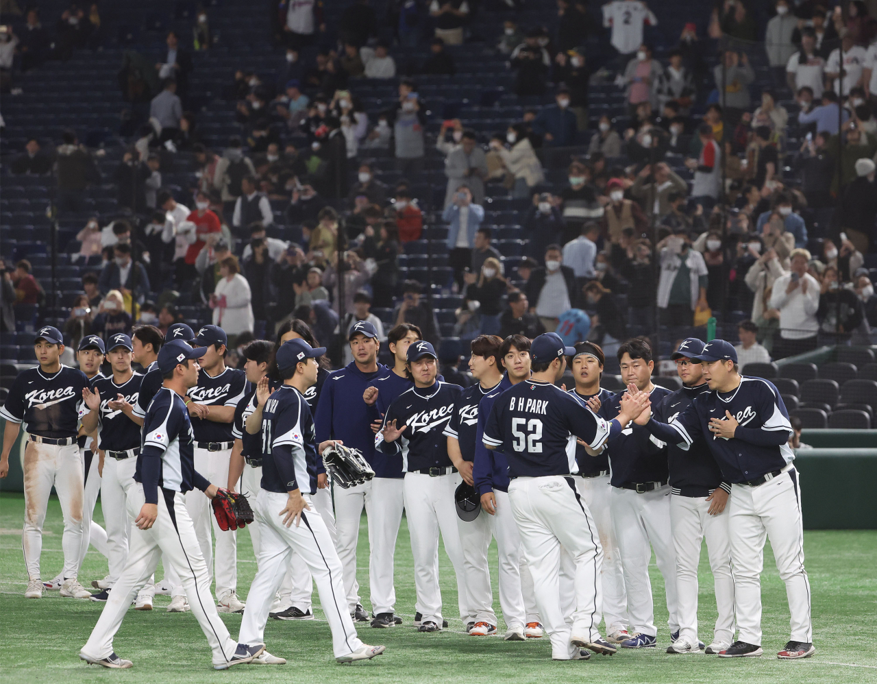 South Korean players celebrate their 22-2 victory over China in a Pool B game at the World Baseball Classic at Tokyo Dome in Tokyo on Monday. (Yonhap)