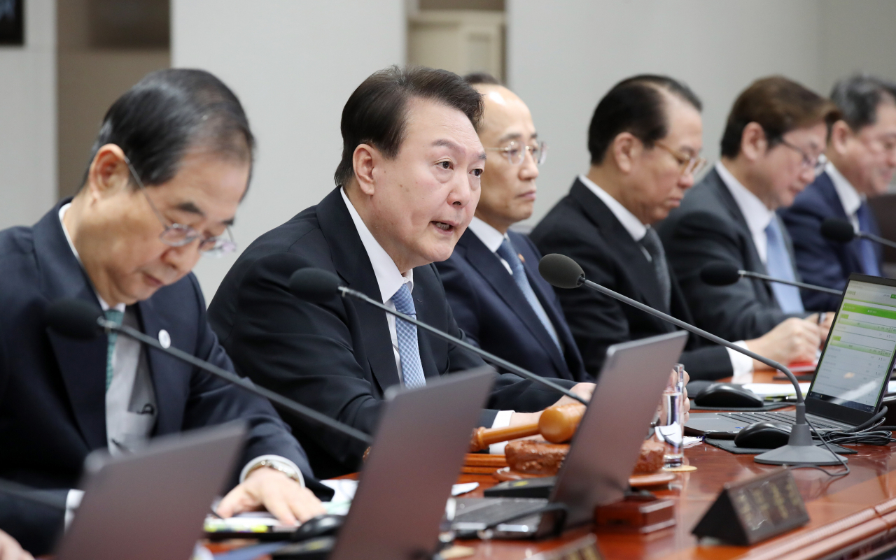 President Yoon Suk Yeol speaks at a cabinet meeting held at the presidential office in Yongsan, Seoul, on Feb. 21. (Yonhap)