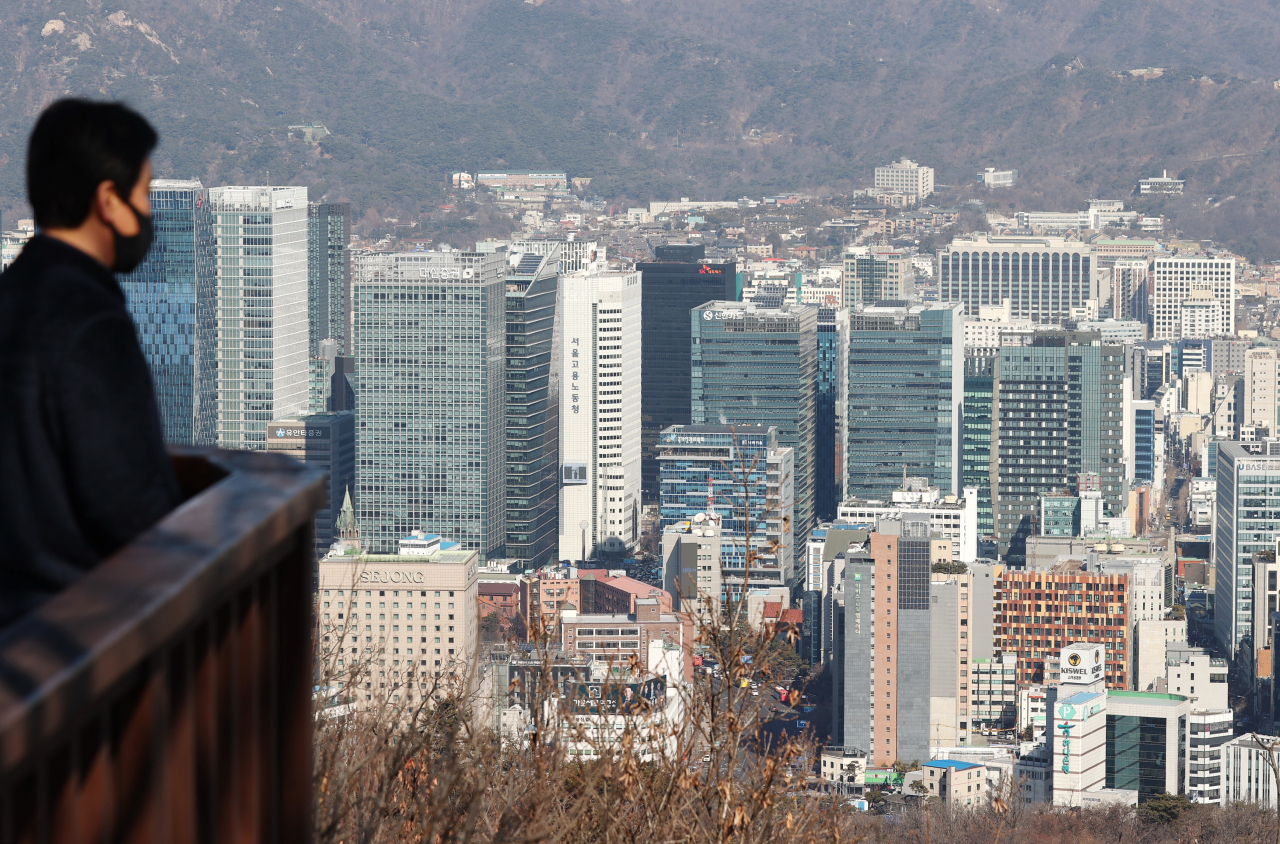 Office buildings are seen from the hillside of Namsan Park. (Yonhap)