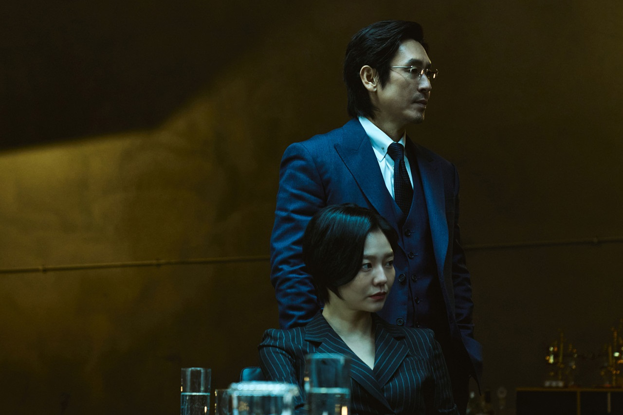 Sol Kyung-gu (right) and Lee Som in “Kill Boksoon” (Netflix)