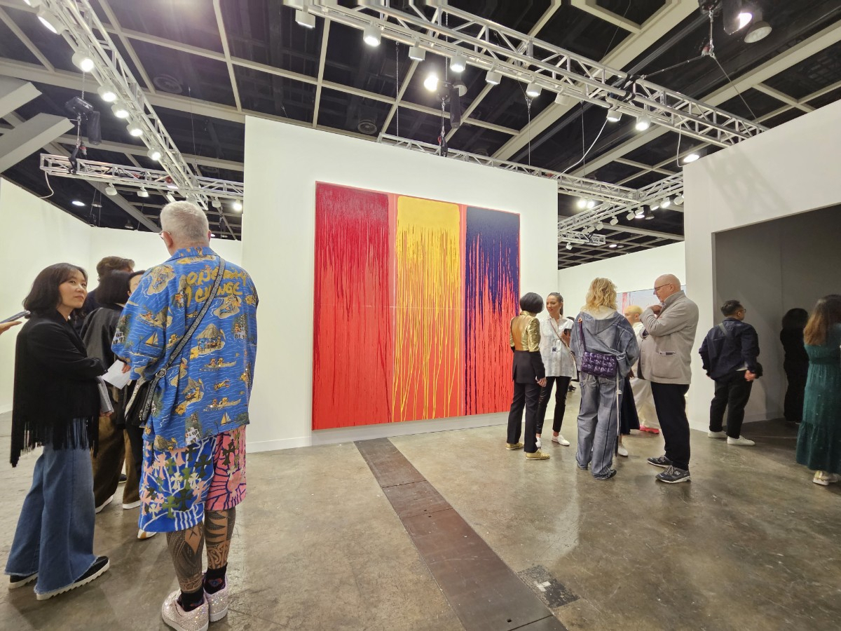 Visitors view art on display at Hauser & Wirth's booth on Tuesday at Art Basel Hong Kong. (Park Yuna/The Korea Herald)