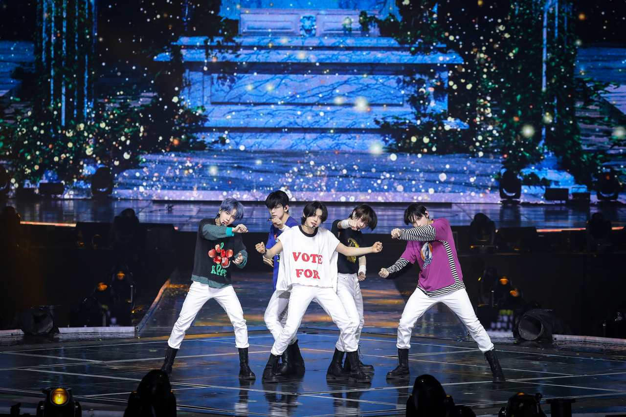 K-pop band Tomorrow X Together performs at a concert of its world tour, 