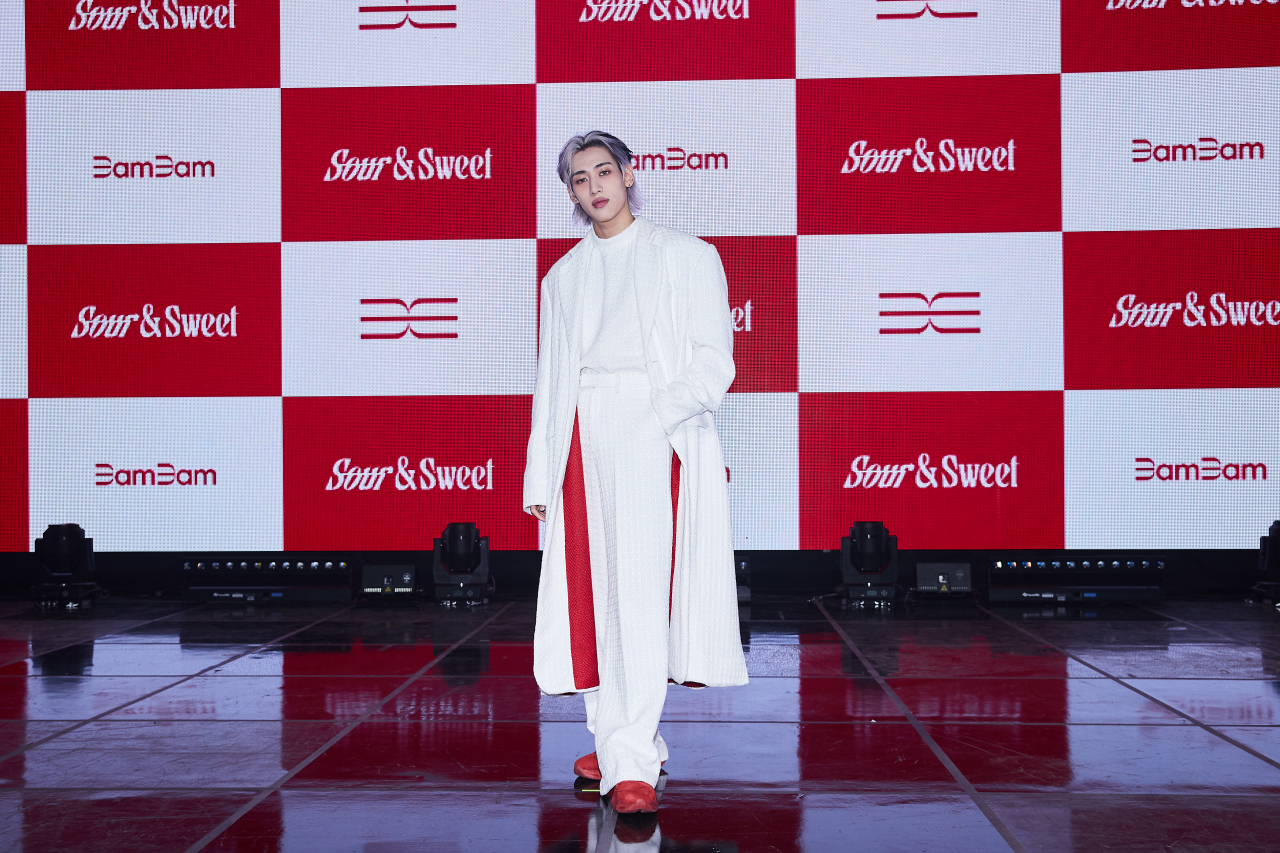 K-pop singer BamBam poses for picture during a press conference for his first LP