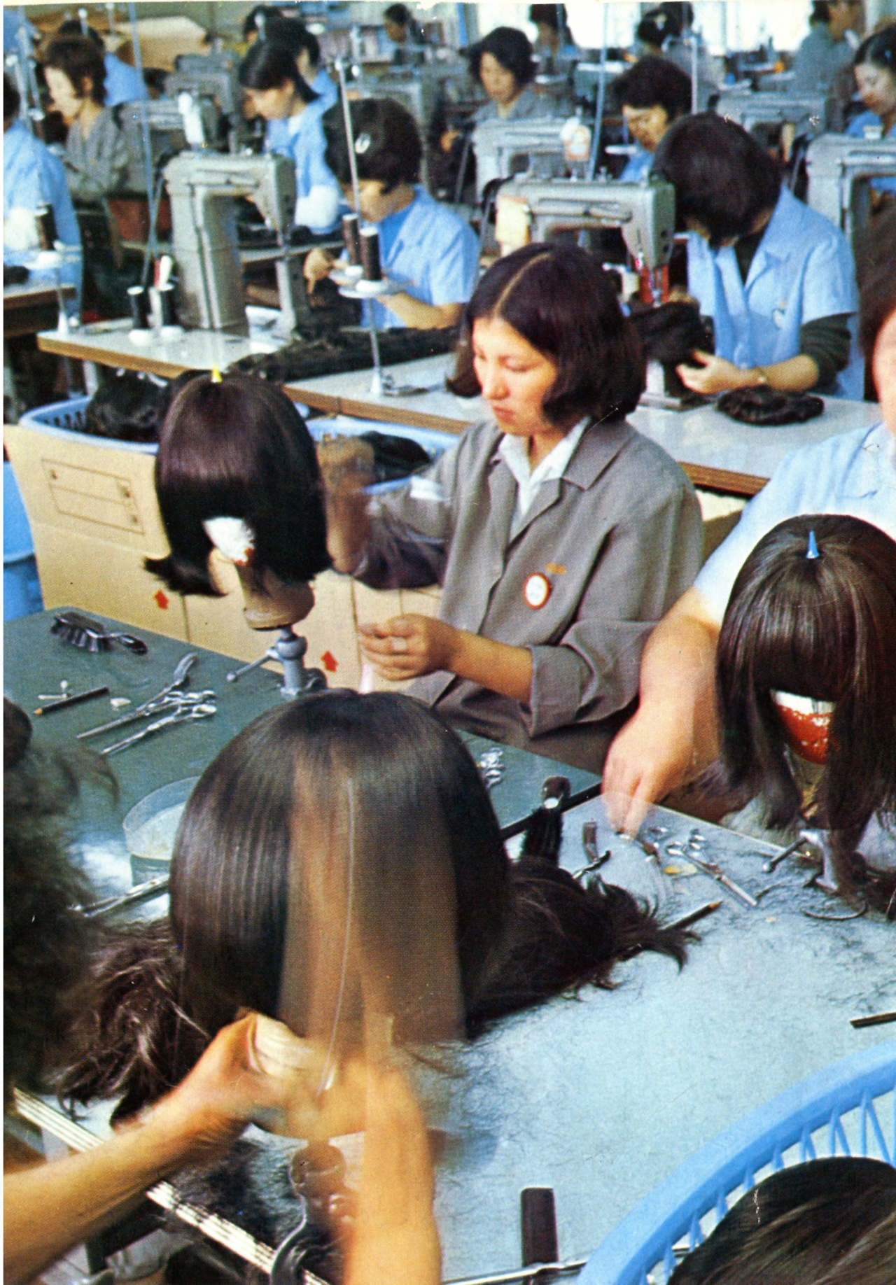 This undated file photo shows workers at a wig factory, which was a major export item for South Korea in the 1960s. (The Korea Herald)