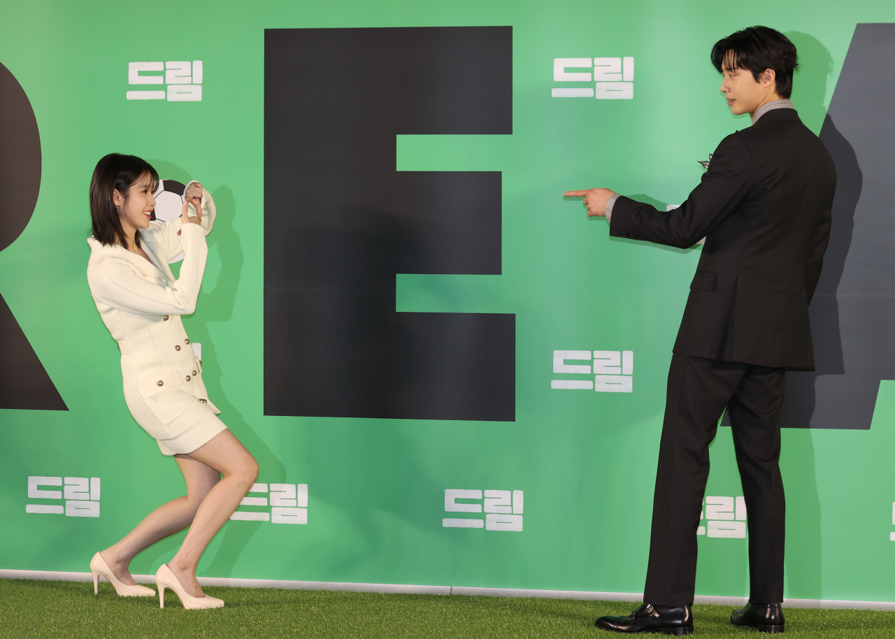 Actors IU and Park Seo-joon of “Dream” pose for a photo during a press conference held in Seoul, Thursday. (Yonhap)