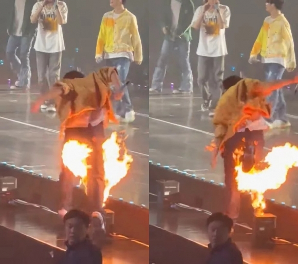 This image circulating on Twitter, purportedly taken by a spectator, shows Yoon Jae-hyun, a member of Treasure, on fire during a gig in Bankgok on April 2. He later confirmed that he suffered only minor burns to his hand.
