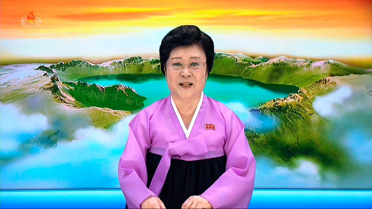 This photo shows news North Korean presenter Ri Chun-hee making a report in June 2020. (Yonhap)