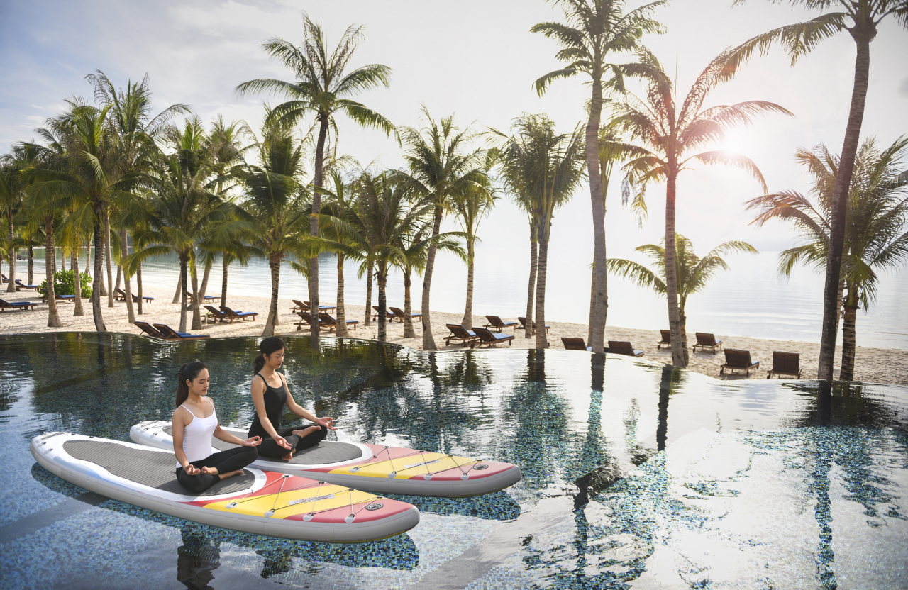 Morning yoga lessons are offered at JW Marriott Phu Quoc Emerald Bay Resort & Spa, on Phu Quoc Island, Vietnam (JW Marriott)