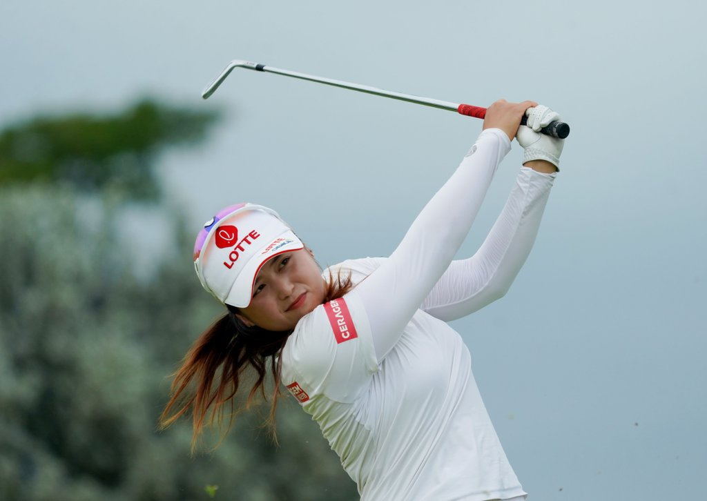 Choi Hye-jin of South Korea tees off on the 16th hole during the second round of the Hana Financial Group Singapore Women's Open at Tanah Merah Country Club in Singapore on Dec. 10, 2022, (Singapore tournament organizing committee)