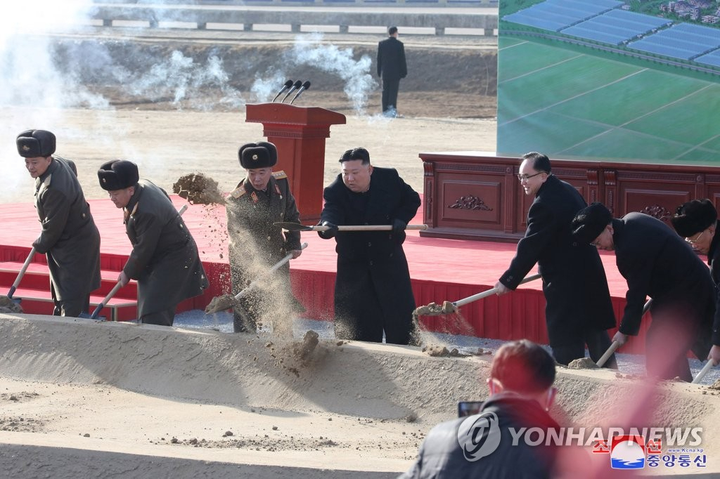 This file photo from Feb. 16 shows North Korean leader Kim Jong-un (center) attending a groundbreaking ceremony for a greenhouse farm in Pyongyang. (KCNA)