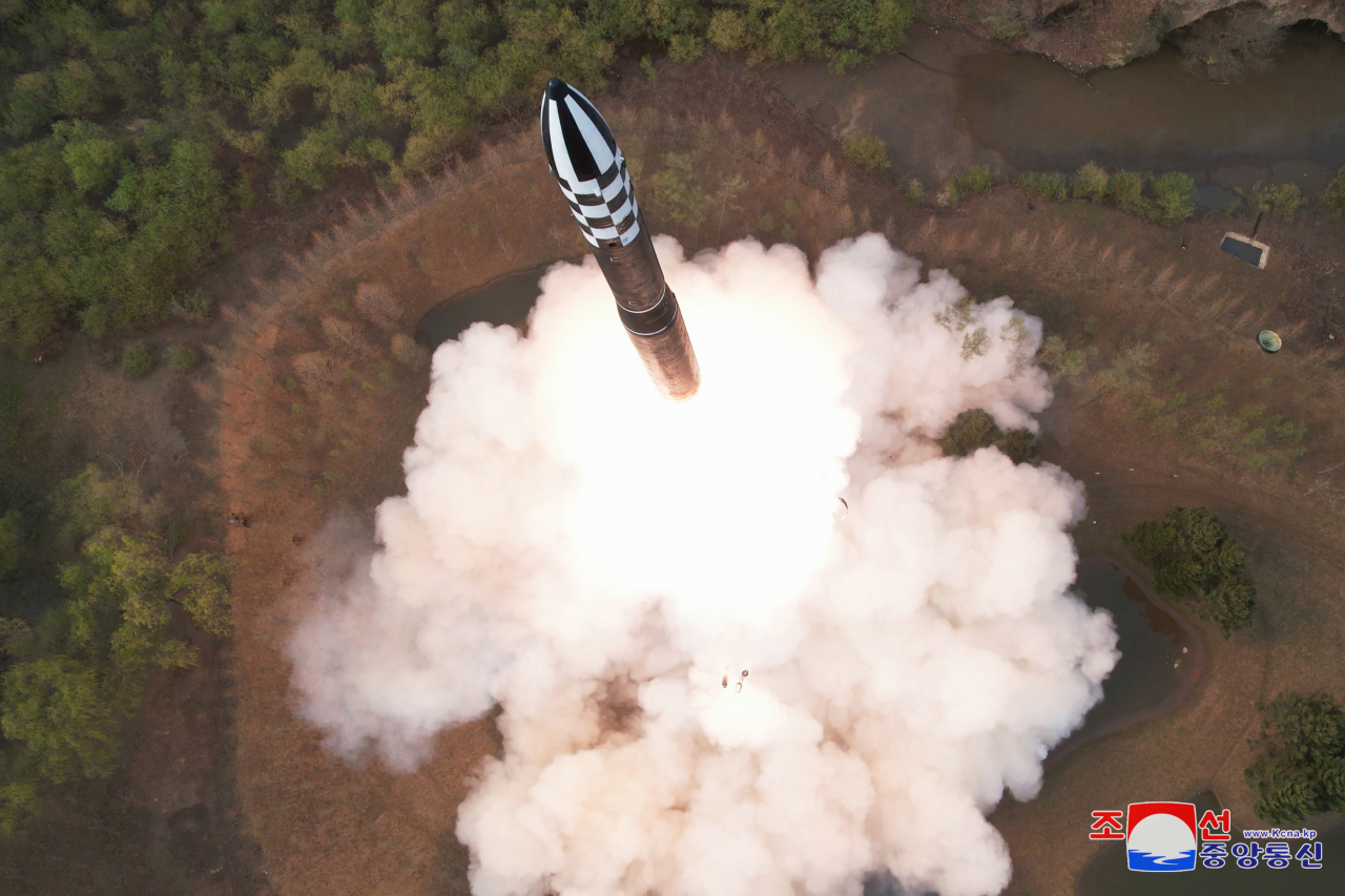 This photo, provided by North Korea's official Korean Central News Agency on April 14, 2023, shows the North's new solid-fuel Hwasong-18 intercontinental ballistic missile (ICBM), test-fired the previous day under the guidance of North Korean leader Kim Jong-un. (Yonhap)