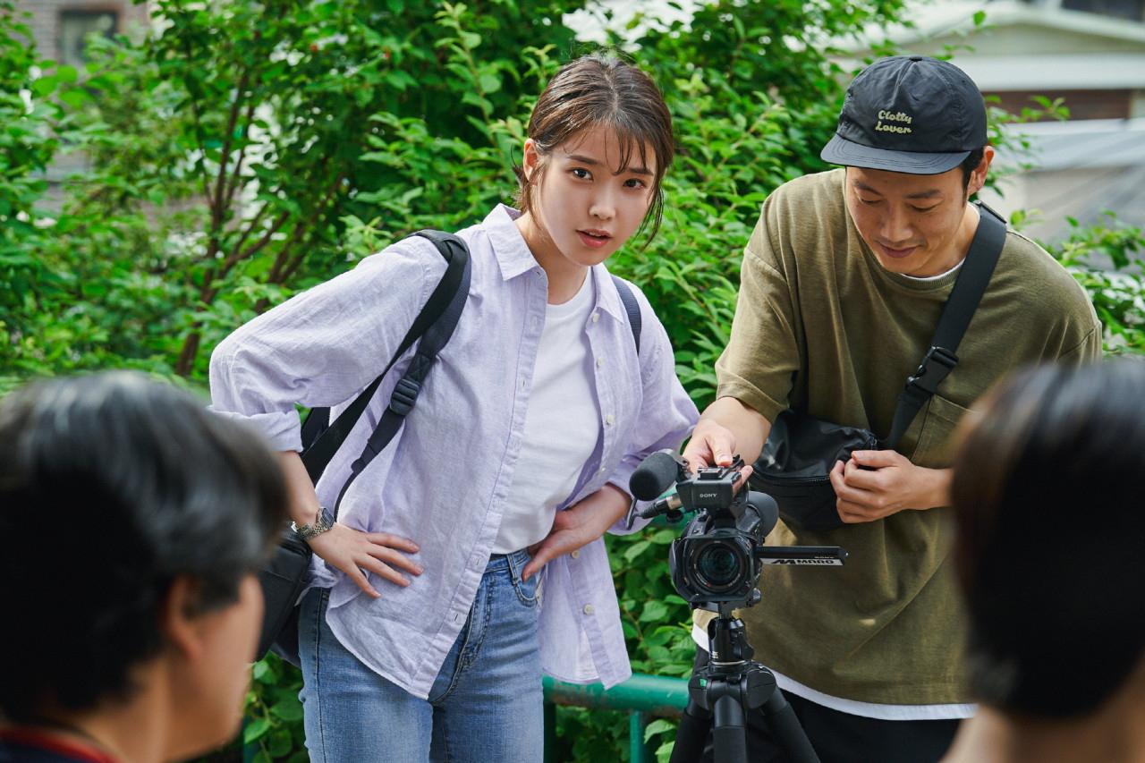 IU stars as So-min, a documentary producer, in “Dream.” (Plus M Entertainment)